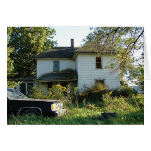 Cartão Casa e carro abandonados em Iowa rural