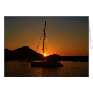 Cartão Catamaran no pôr do sol Ibiza.