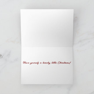 Cartão Cena de praia com o chapéu de Papai Noel dobrado