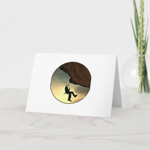 Cartão Climbing mountain man at sunset