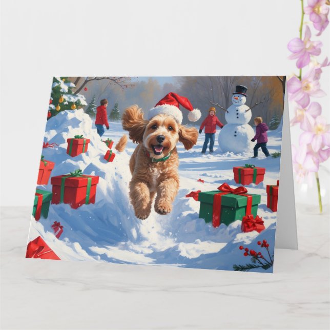 Cartão Cockapoo Correndo na Neve com Chapéu de Natal (Orquídea)
