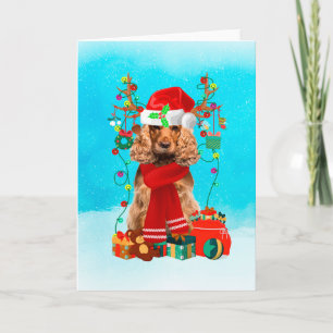 Cartão Cocker Spaniel em neve com presentes de Natal