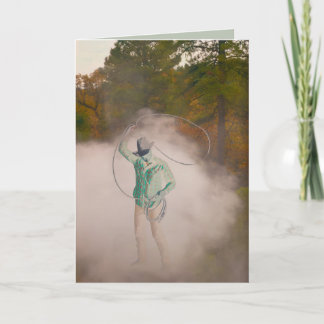 Cartão Cowboy man roping stirring up dust out west