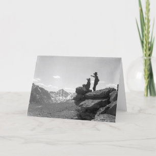 Cartão Cowboys em um cume