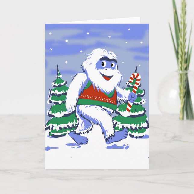 Cartão Cristmas de yeti, que é um gato na floresta (Frente)
