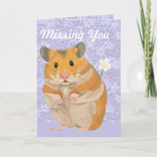 Cartão Cute little Hamster holding a flower “Missing You”