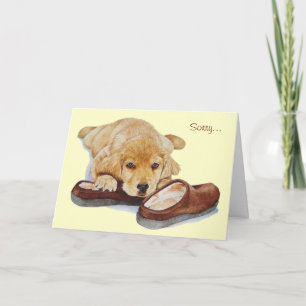 Cartão cute puppy golden retriever dog cuddling slippers