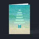 Cartão da árvore da palavra do Natal da praia<br><div class="desc">Uma foto da praia com a árvore bonita do mar & da estrela do mar e de Natal da palavra.</div>