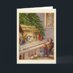 Cartão da natividade da igreja do vintage<br><div class="desc">Cartão retro/natal vintage.  Duas crianças adoráveis que ajoelham-se e que praying na frente do berçário na igreja!</div>