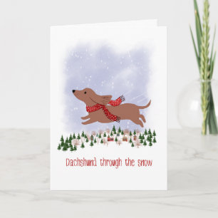 Cartão Dachshund de Natal Através da Neve