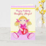 Cartão Daughter rag doll first birthday<br><div class="desc">Whimsical girls ragdoll painted birthday greetings card,  ideal for a little girl's birthday. Cute pink,  red,  purple,  yellow and white colors. Personalize with your own Daughter's name and age. Original watercolor painting and design by Sarah Trett for www.mylittleeden.com on Zazzle.</div>