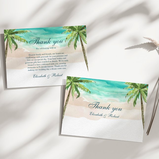Cartão De Agradecimento Casamento de Aquarela Tropical Beach e Palm Trees (Watercolor Tropical Beach and Palm Trees Wedding Thank You Card on a sunny white table.)