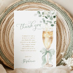 Cartão De Agradecimento Champagne Greenery Thank You Card<br><div class="desc">Send a touch of botanical beauty and heartfelt thanks with these exquisite bridal shower thank you cards. The design features a captivating illustration of a champagne flute, elegantly tied with a sage green ribbon and surrounded by a garland of fresh eucalyptus. The delicate script and the natural, airy aesthetic provide...</div>