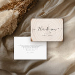 Cartão De Agradecimento Rustic Tree Ring Wood Script Calligraphy Wedding<br><div class="desc">Send heartfelt gratitude with this rustic wedding thank-you card featuring a soft tree-ring wood background and elegant black script “thank you” on the front. Personalized names beneath the greeting add a warm, custom touch that coordinates with woodland, barn, and outdoor wedding themes. The back includes space for your message of...</div>