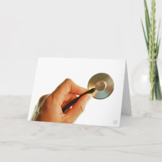 Cartão De Agradecimento Stethoscoop in een hand voor een ziekenhuis sfeer.