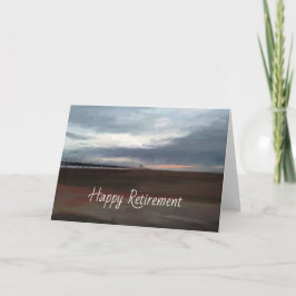 Cartão de aposentadoria no píer à beira-mar