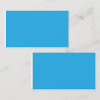 um fundo azul com um gato preto e branco