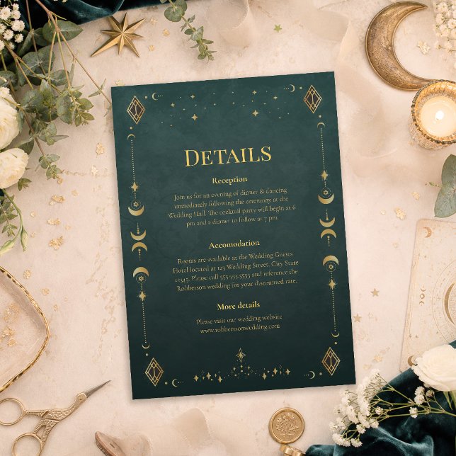 Cartão de Detalhes de Casamento Celestial Gótico A (Celestial Gothic Dark Teal Wedding Details Card on a table with dark teal wedding decor and flowers)