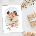 Cartão De Festividades Arco Vermelho Elegante Coquette Arch Duas Fotograf<br><div class="desc">Espalhe a alegria de feriado com este Cartões de foto de Natal Vermelho Personalizado, com um arco de fita vermelho encantador e espaço para sua foto personalizada da família, tanto na frente quanto no verso. Este cartão de férias elegante é perfeito para compartilhar seus desejos mais quentes e mostrar suas...</div>