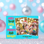 Cartão De Festividades Azul Brilhante Feliz Natal Duas Colagem Fotográfic<br><div class="desc">Cartões de natal de colagem de fotos da família, bonitos e alegres, com uma fita colorida de luzes de Natal enroladas em torno de suas duas fotografias favoritas. Que seus dias sejam Feliz e Brilho escritos em letras negrito. Um arco-íris de cores para os feriados. Adicione suas duas fotos verticais...</div>