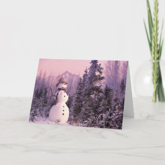 Cartão De Festividades Boneco de neve do por do sol nas montanhas do