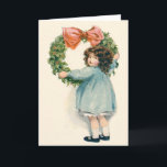Cartão De Festividades Bonita Menina Bonita Holly Wreath Arco Rosa<br><div class="desc">Hora de celebrar as férias. Este impressão natal vintage retrata uma menina bonita pendurada numa coroa oca.</div>