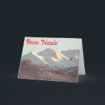 Cartão De Festividades Buon Natale - águia-inverno<br><div class="desc">Uma águia-careca voa perto da faixa de Chugach coberta pela neve perto de Anchorage,  AK. O texto italiano que lê "Buon Natale" aparece em vermelho.</div>