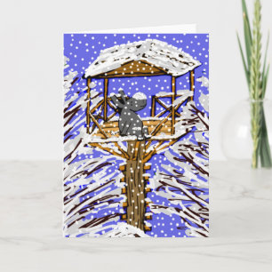 Cartão De Festividades burro na casa de areia na neve