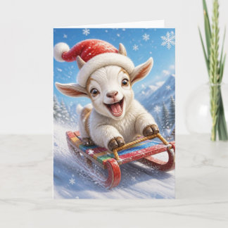 Cartão De Festividades Cabra engraçada deslizando no trenó na neve no Nat