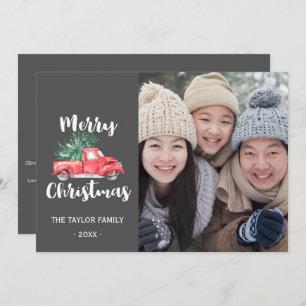 Cartão De Festividades Caminhão Vermelho e Ano de Árvore em Revisão Foto