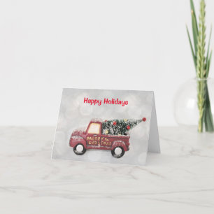 Cartão De Festividades caminhão vintage vermelho em um fundo bokeh cinza