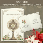 Cartão De Festividades Católico Eucarista Poinsettia Floral<br><div class="desc">Apresentando uma bela imagem vintage do Santo Eucarista em um monstro de ouro adorado com um buquê floral de Natal. Outro belo buquê de Natal é dentro com um verso de escrituras abaixo. Todo texto pode ser modificado.</div>