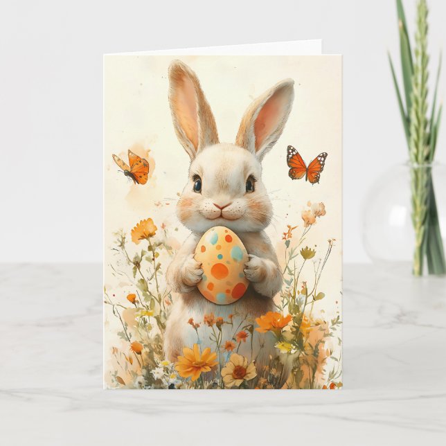 Cartão De Festividades Coelhinho de Páscoa com Ovo Pintado e Flor Selvage (Frente)