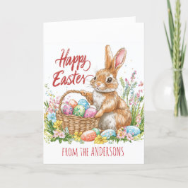 Cartão De Festividades Coelho segurando uma cesta cheia de ovos de Páscoa