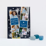 Cartão De Festividades Colagem de Fotos de Neve Photobooth Hanukkah<br><div class="desc">O cartão com fotos Chanucá bonito apresenta duas faixas de fotos, cada uma com três fotos e um painel de texto azul, para um total de seis fotos. Personalize com o ano e o seu nome ou nomes familiares em caracteres brancos, festivos e brancos, num fundo azul marinho, pontilhado com...</div>