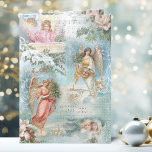 Cartão De Festividades Coro de Natais vintages Invernos Colagem<br><div class="desc">Colagem encantadora de lindos anjos vitorianos,  pinheiro coberto de neve,  rosas,  holly,  música de Natal,  tipografia,  vergreens e paisagens rurais rústicas,  confinadas com delicado filigre branco sobre fundo azul claro do céu.</div>