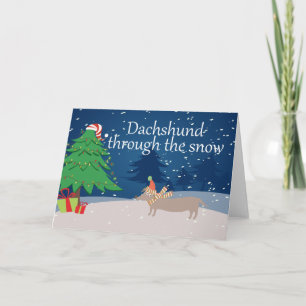 Cartão De Festividades Dachshund Através Da Neve