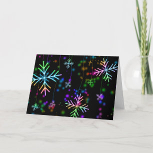 Cartão De Festividades design de Natal com flocos de neve multicoloridos