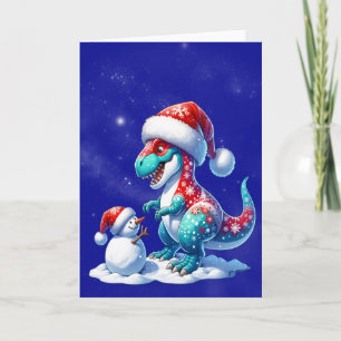 Cartão De Festividades Dinossauro com chapéu de Papai Noel construindo um