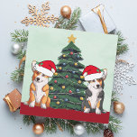 Cartão De Festividades Dois Corgi - Árvore de Natal - Cachorro Santa Hat<br><div class="desc">Estes lindos cães Pembroke Welsh Corgi têm a cabeça inclinada dentro de um bonitinho chapéu de Papai Noel. Os dois filhotes estão sentados em frente a uma bonito árvore de Natal decorada com ornamentos coloridos. Um belo cartão de férias de corgis com um maravilhoso desenho de um tricolor e um...</div>