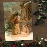 Cartão De Festividades Dourada Vintage Pai Natal e Anjo<br><div class="desc">Pai Natal do Velho Mundo em túnica de ouro fortemente ornamentada,  com presentes e árvore com anjo alado. Lindos gráficos complementares atrás com campos de texto editáveis.</div>