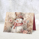 Cartão De Festividades Elegante Floral Snowman Natal<br><div class="desc">Um cartão de Natal dobrado,  cor-de-água rosa-d'água,  cor-de-rosa. Apresenta uma mensagem e um nome no dentro. Personalize isso com sua própria mensagem de cartões de natal e seu nome de família! Este é um cartão bonito e único para enviar aos seus amigos e família para as férias.</div>