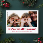 Cartão De Festividades Estamos no Natal da família, completamente normal<br><div class="desc">Capturar a alegria e o humor da estação com este cartão de Natal "Somos Totalmente Normais". Apresentando uma foto de família sincera, esta design abraça os momentos engraçados e bobos que tornam sua família única. O texto vermelho moderno e o layout simples oferecem um toque charmoso, mas humorístico, fazer este...</div>