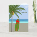 Cartão De Festividades Estilo do Hawaiian do Feliz Natal<br><div class="desc">Cartão de Natal com palmeira e prancha na praia</div>