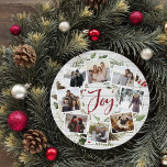 Cartão De Festividades Farmhouse Wreath | Colagem de Fotografias<br><div class="desc">Um design de cartão festivo em forma redonda única que apresenta oito das suas fotos favoritas organizadas em um design de coroa redonda acentuado pela folhagem verde de aquarela, cones de pinho e groselhas vermelhas em um fundo branco de proteção para madeira. "Joy" aparece no centro na tipografia de pincel...</div>