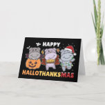 Cartão De Festividades Feliz Hallothanksmas Hippos Christmas Hippo Holida<br><div class="desc">Feliz Hallothanksmas - Feliz Halloween,  Ação de Graças e Natal. O hipopótamo está vestido como um morcego no Halloween. Com uma torta para o Dia de Ação de Graças,  decorada com bonés de Papai noel no Natal.</div>