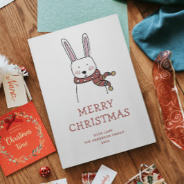 Cartão De Festividades Feliz Natal. Coelho de inverno engraçado e bonito