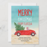 Cartão De Festividades Feliz Natal Da Florida Tropical Beach<br><div class="desc">Este feliz Feliz Natal da Flórida é a nossa versão das fabulosas partes de neve de caminhão vermelho que pegam picape do mundo estão enviando esta temporada de férias. Ele apresenta um conversível vermelho — de cima para baixo, é claro! — com uma árvore de Natal guardada no banco de...</div>