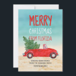 Cartão De Festividades Feliz Natal Da Florida Tropical Beach<br><div class="desc">Este feliz Feliz Natal da Flórida é a nossa versão das fabulosas partes de neve de caminhão vermelho que pegam picape do mundo estão enviando esta temporada de férias. Ele apresenta um conversível vermelho — de cima para baixo, é claro! — com uma árvore de Natal guardada no banco de...</div>