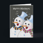 Cartão De Festividades Feliz Natal Jolly Cantando Casal de Neves<br><div class="desc">Um bonitinho cartão de Natal com tema,  com um casal alegre e festivo de neve com lenços coloridos de lã,  cantando canções de férias. Um cartão muito alegre e feliz para os feriados. Texto frontal: Feliz Férias. ©PamJArts</div>